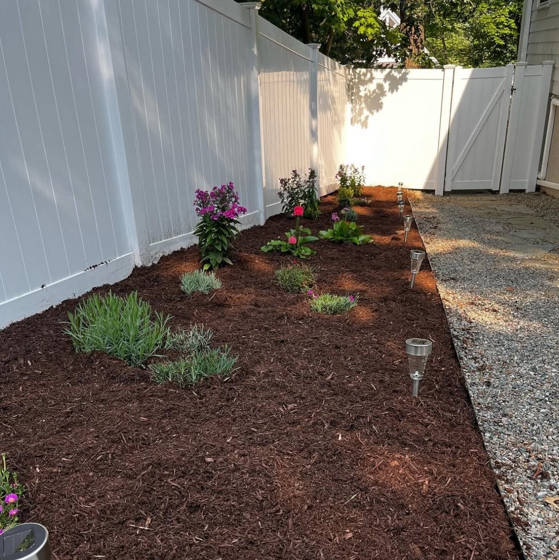 Mulch & Gravel Install: Enhance the health and beauty of your garden with our expert mulching and gravel services!